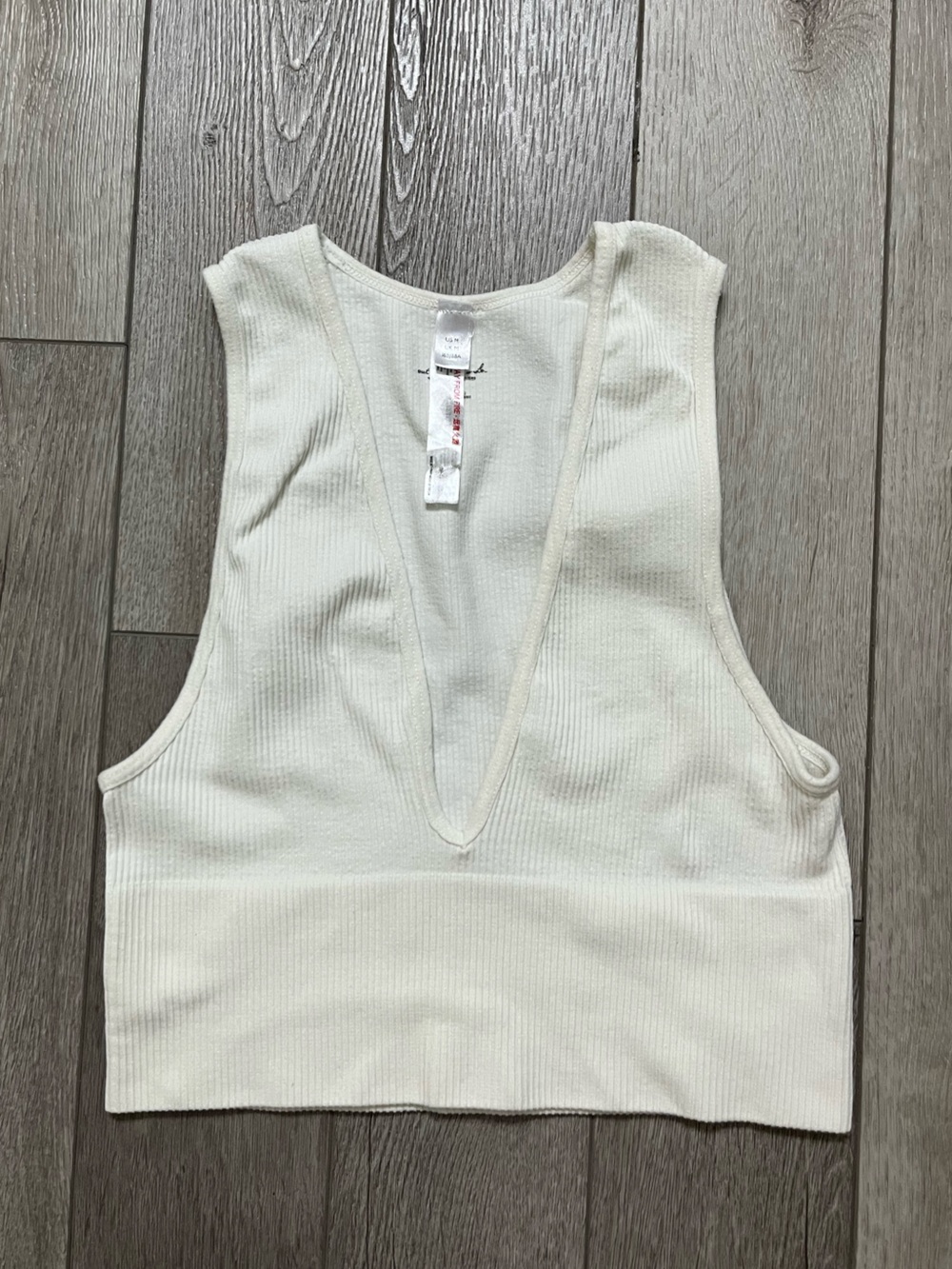 Women's Cream Ribbed V-Neck Tank Top
Size Medium/Small